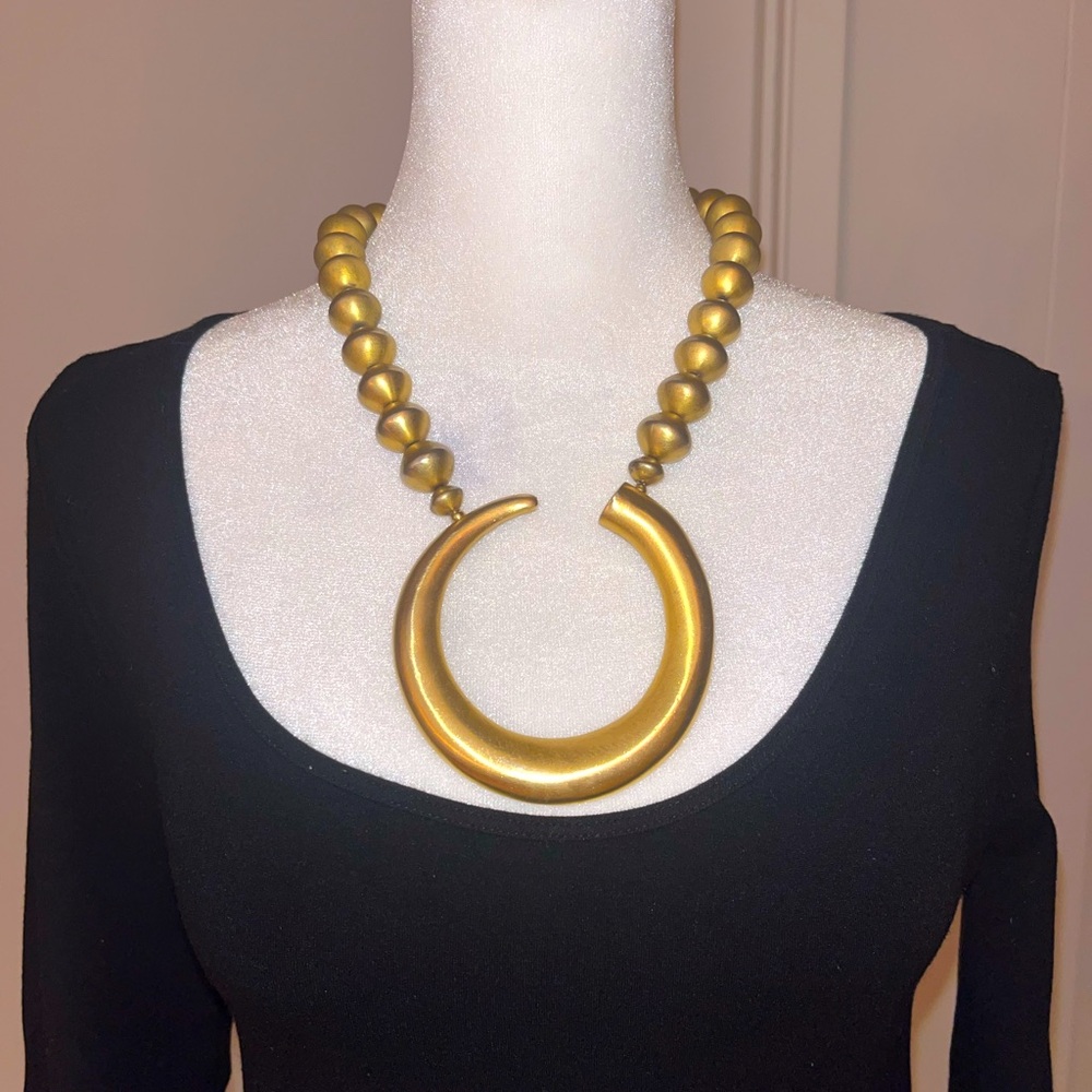 Gold tone necklace